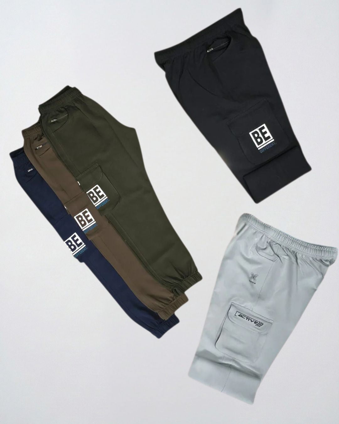 Assorted track pants in navy, brown, olive, black, and light grey with side pockets and labels
